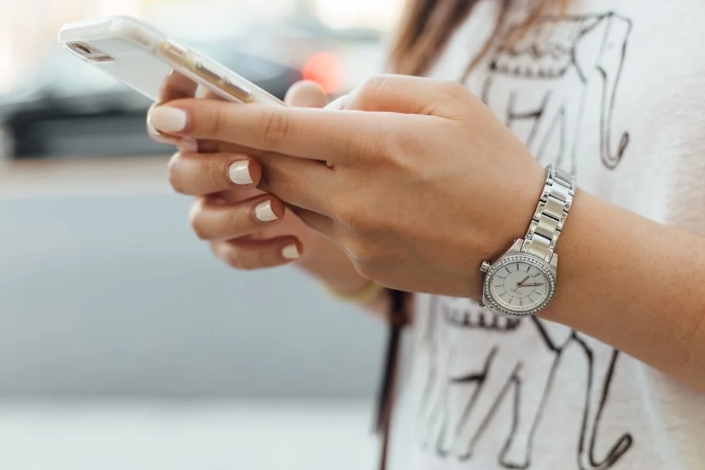 Woman using smartphone outdoors